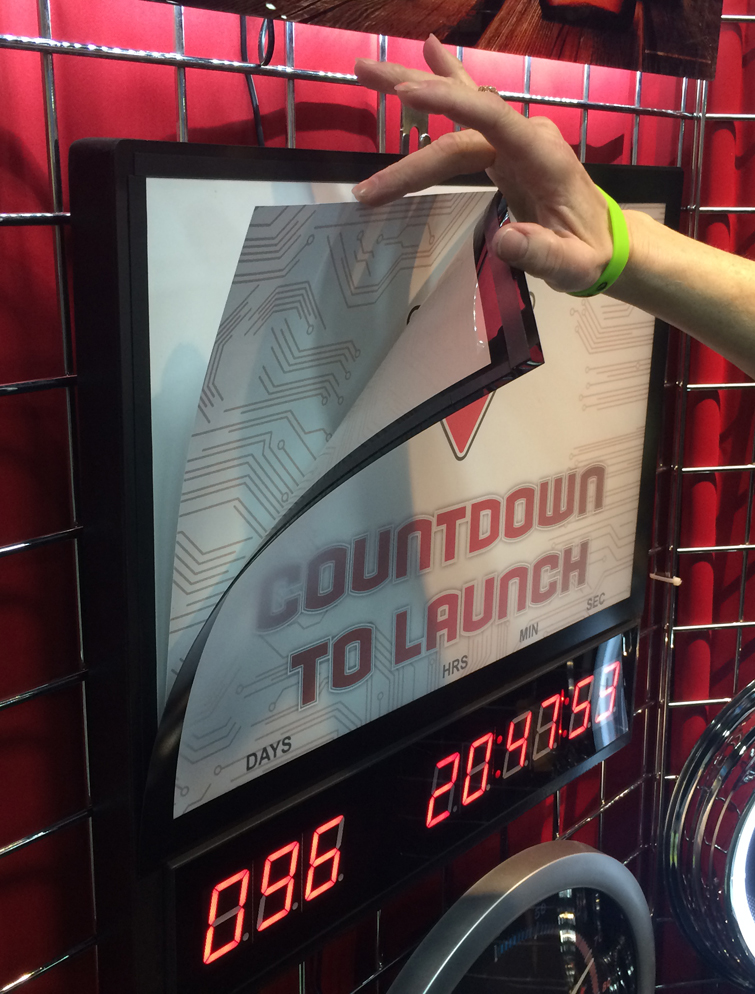 LED Countdown clock with interchangeable top advertising panels.